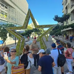 People gathered around a large star.